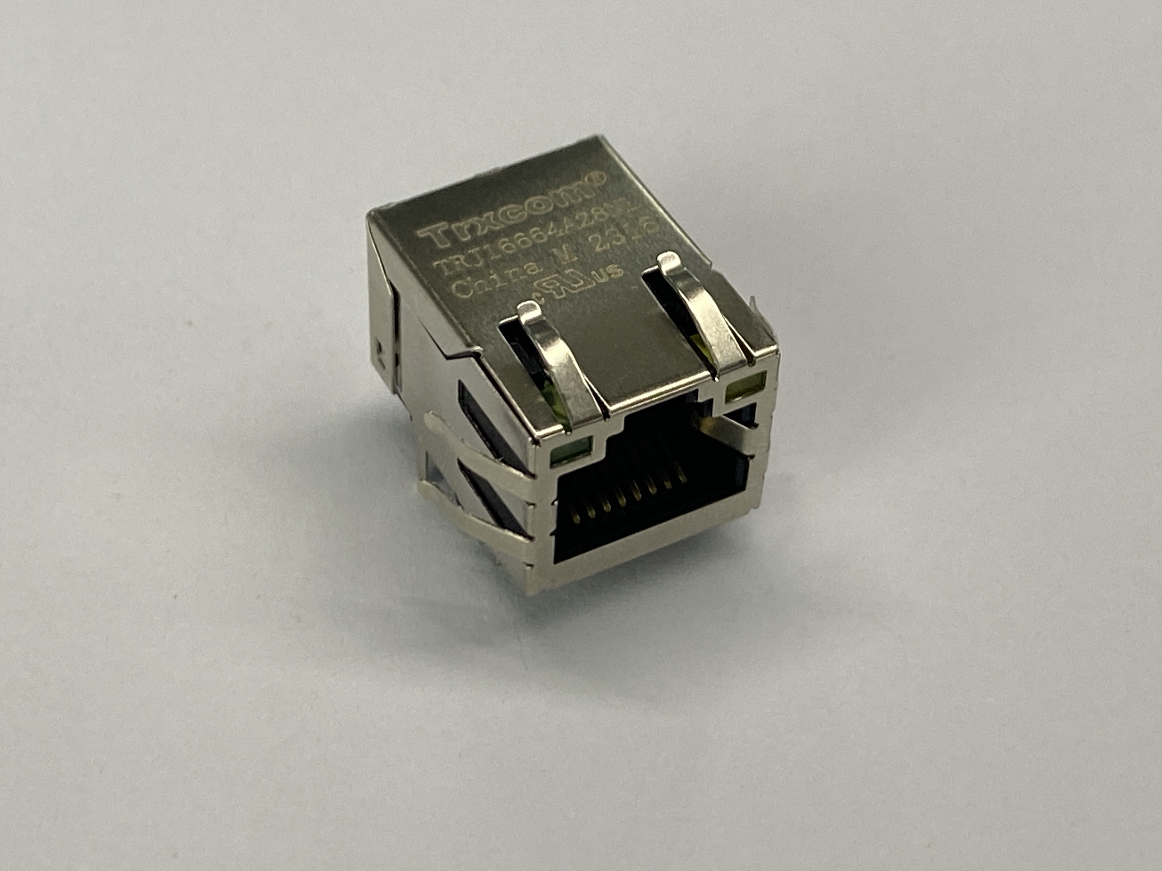 Разъем RJ-45 10/100Base-TX, 2 светод. (пр. угол на плату) TRXCOM TRJ16664A28NL