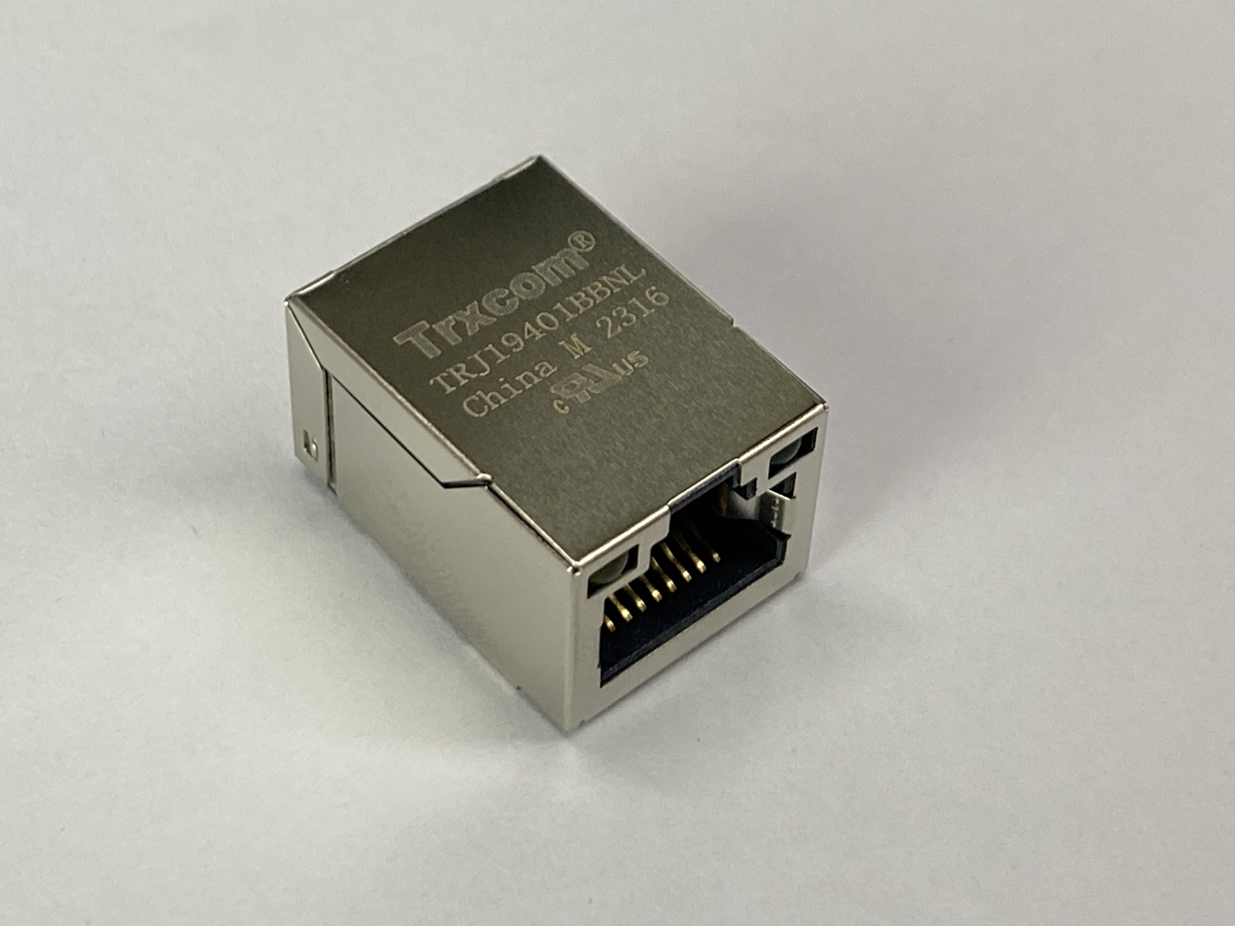 Разъем RJ-45 10/100Base-TX, 2 светод., без лепестк. (гориз. SMT на плату) TRXCOM TRJ19401BBNL