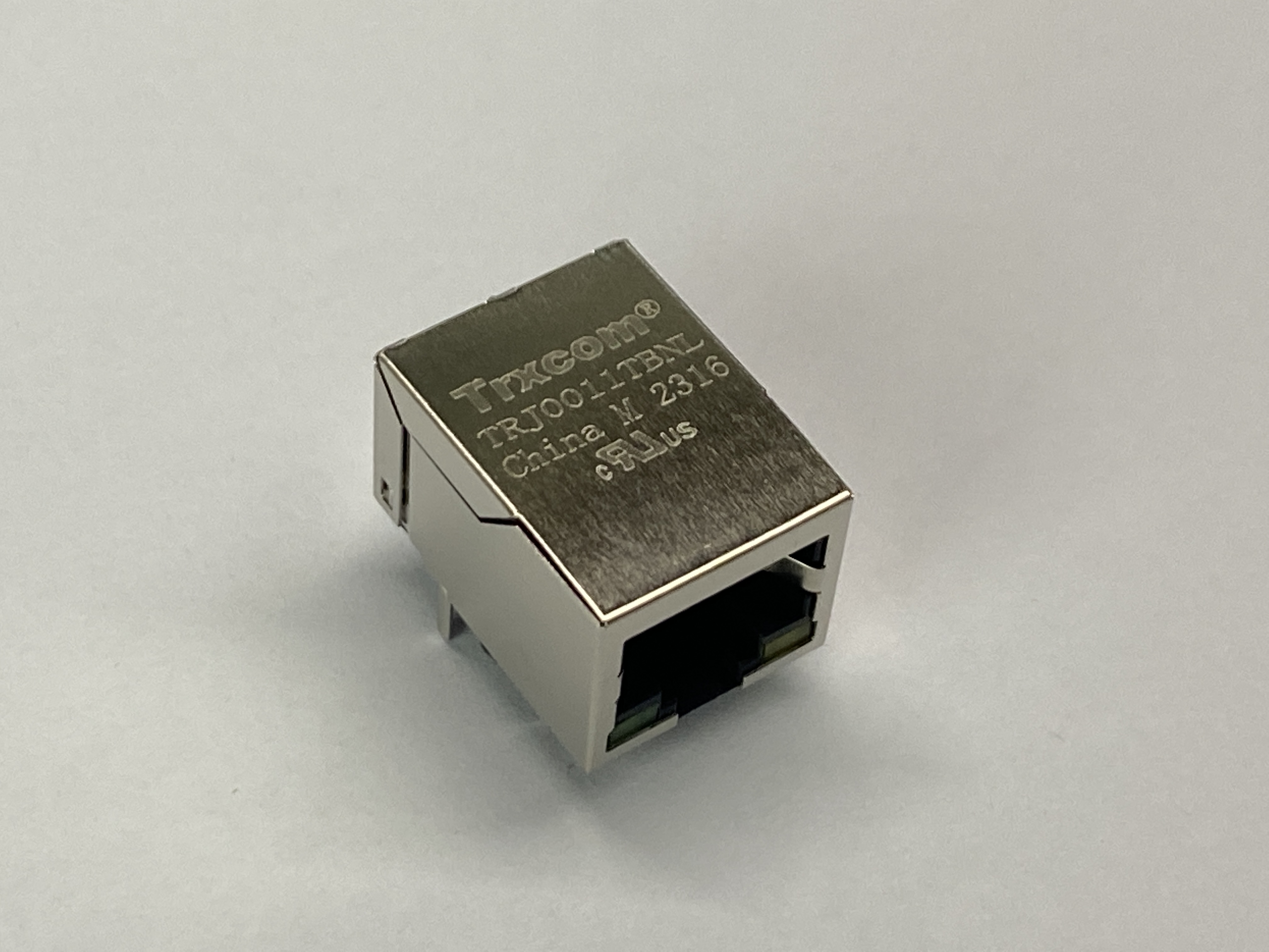 Разъем RJ-45 10/100Base-TX, 2 свет., на плату (ан. J00-0045NL*/ J0011D01BNL*) TRXCOM TRJ0011TBNL